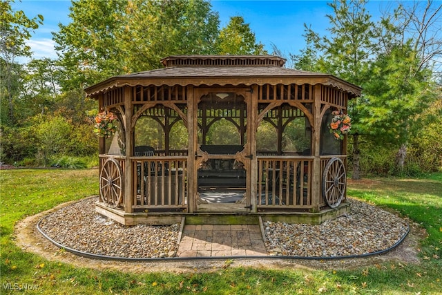 view of community with a gazebo and a yard