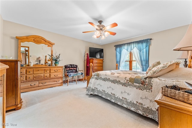 bedroom featuring carpet and ceiling fan