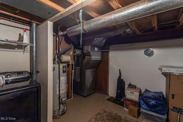 basement featuring washer / clothes dryer and gas water heater