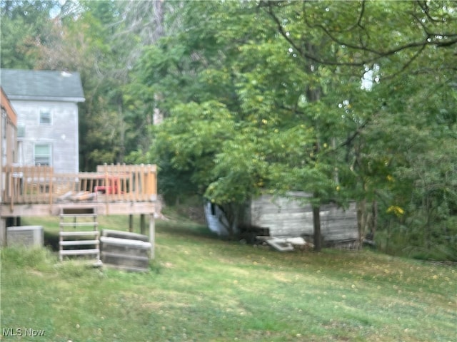 view of yard with central air condition unit