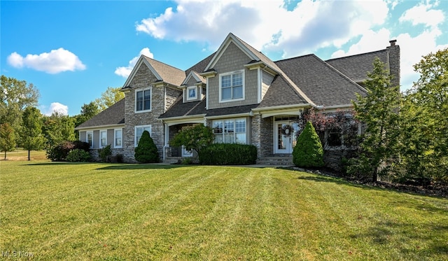 view of front of home featuring a front yard