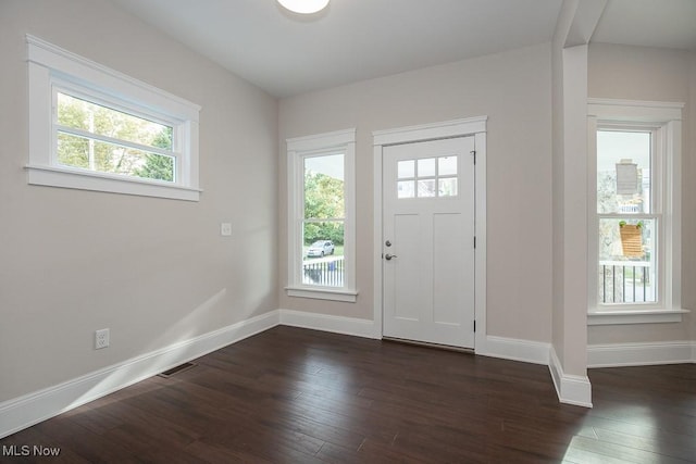 1360 E 114th St, Cleveland, OH 44106 - entryway featuring visible vents, baseboards, and dark wood-style floors