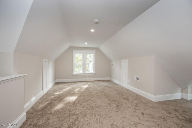 1360 E 114th St, Cleveland, OH 44106 - additional living space with baseboards, recessed lighting, carpet, and lofted ceiling
