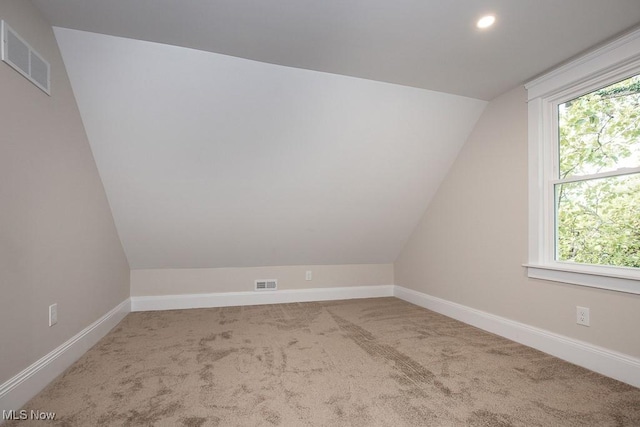 1360 E 114th St, Cleveland, OH 44106 - bonus room featuring visible vents, baseboards, carpet, and vaulted ceiling