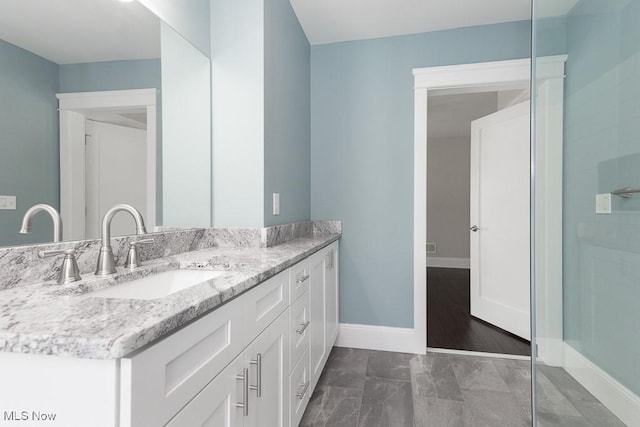 1360 E 114th St, Cleveland, OH 44106 - full bathroom featuring vanity and baseboards