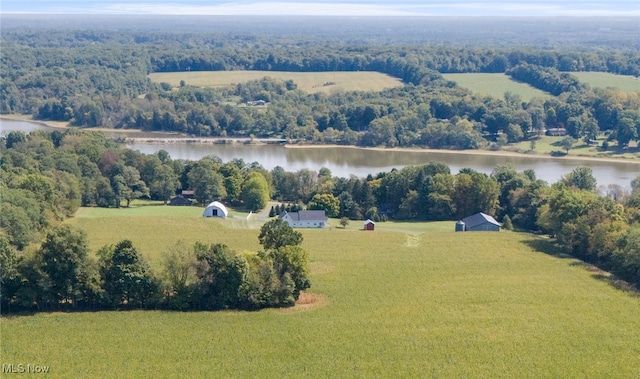 birds eye view of property with a rural view and a water view