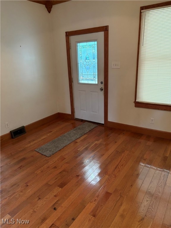 foyer entrance with light hardwood / wood-style flooring