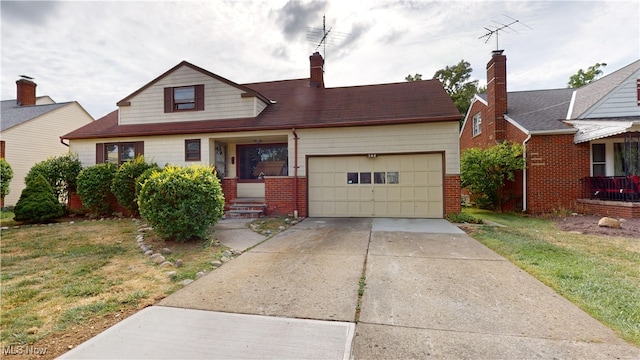 bungalow featuring a front lawn, covered porch, and a garage