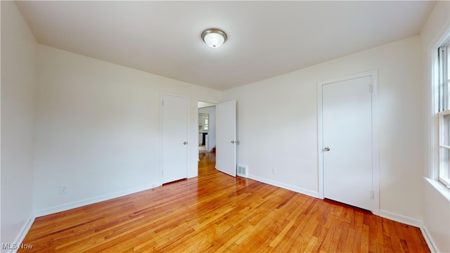 unfurnished bedroom with light hardwood / wood-style floors