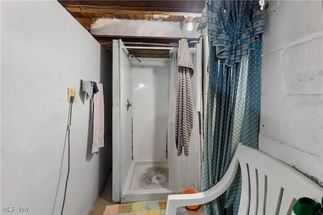 full bathroom with a stall shower