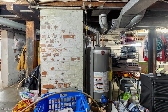 utility room featuring water heater