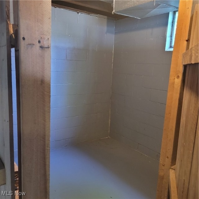 bathroom featuring concrete floors