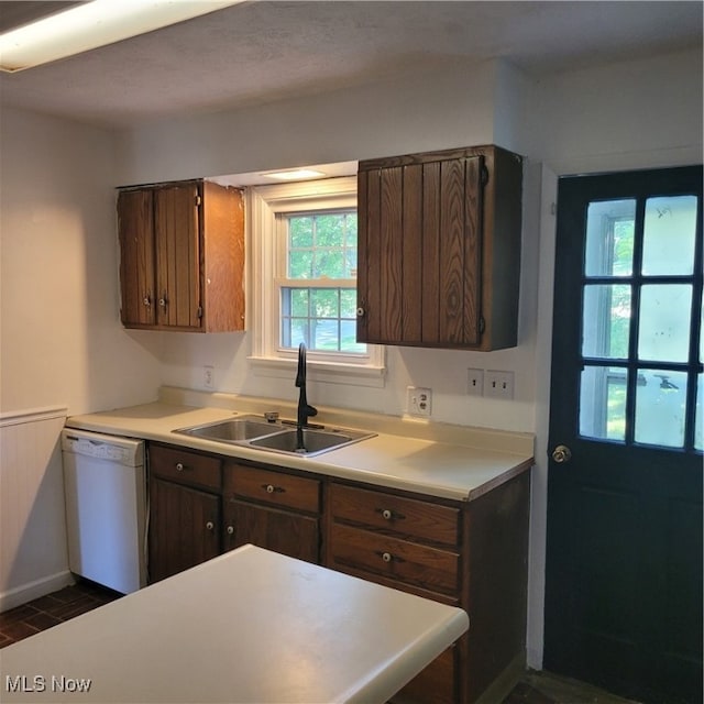 kitchen featuring dishwasher and sink