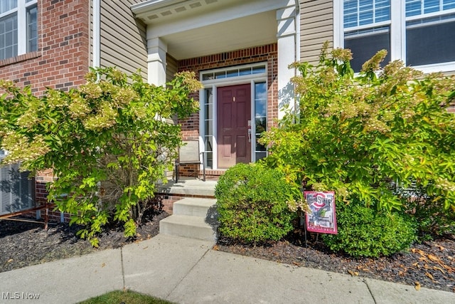 property entrance featuring covered porch