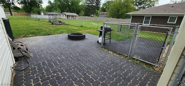 view of patio with grilling area and an outdoor fire pit