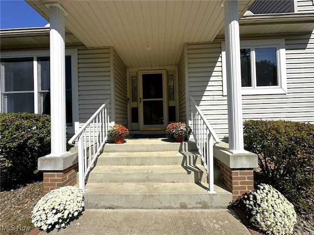 doorway to property featuring a porch