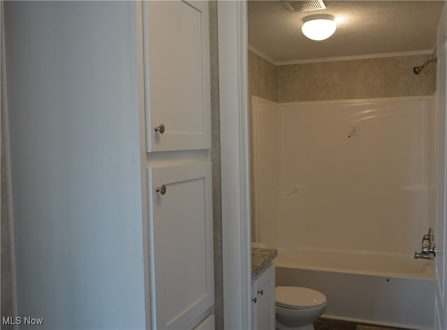 full bathroom with shower / bathing tub combination, a textured ceiling, vanity, and toilet