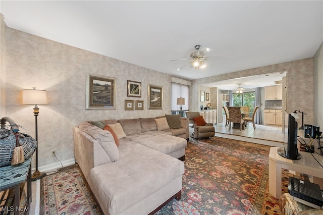 living room with ceiling fan