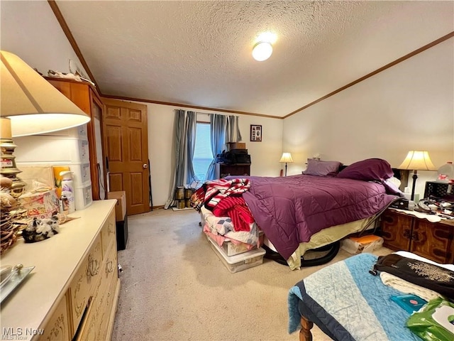 bedroom with light carpet, a textured ceiling, and ornamental molding