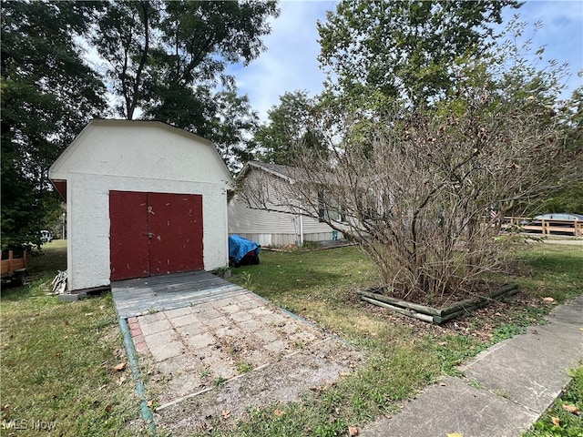 exterior space featuring a storage unit