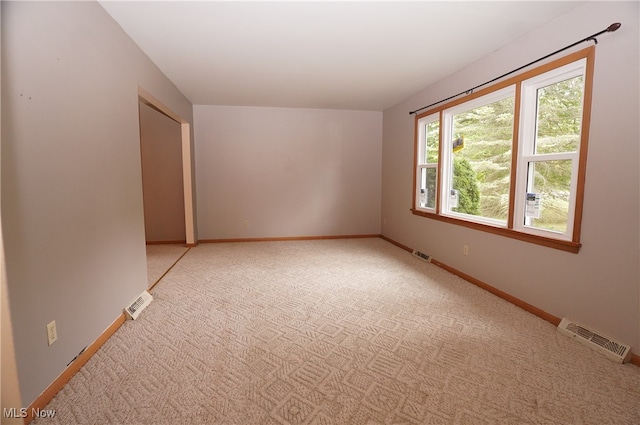 view of carpeted spare room