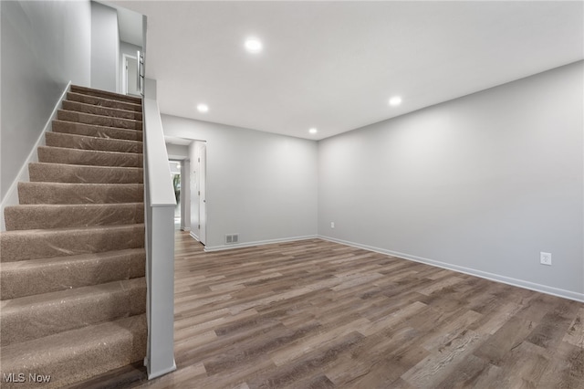 interior space with hardwood / wood-style flooring