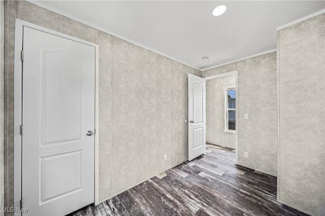 empty room featuring dark hardwood / wood-style floors