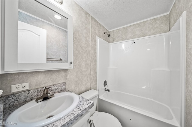 full bathroom with vanity, a textured ceiling, bathing tub / shower combination, and toilet