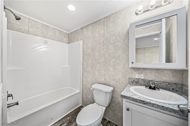 full bathroom with shower / tub combination, a textured ceiling, vanity, and toilet