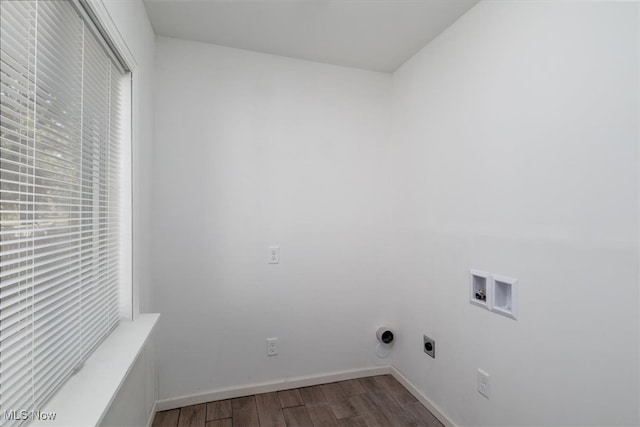 clothes washing area featuring hookup for a washing machine, wood-type flooring, and hookup for an electric dryer