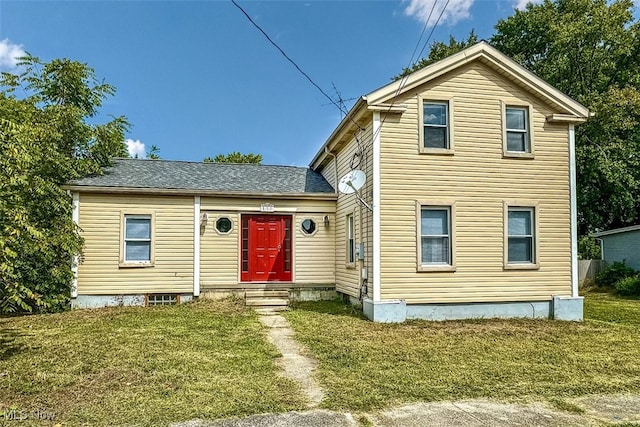 front facade with a front lawn