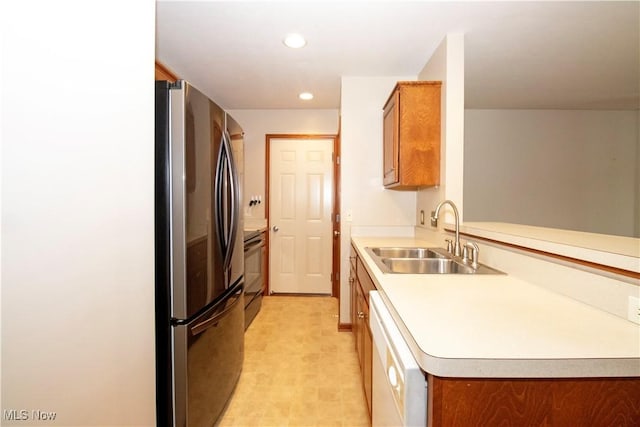 2452 Barrington Way Unit 430, Wooster, OH 44691 - kitchen with freestanding refrigerator, brown cabinetry, recessed lighting, a sink, and white dishwasher