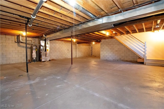 basement with gas water heater and heating unit