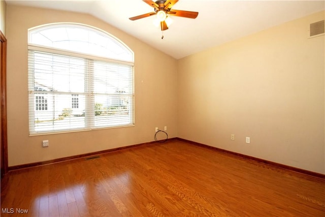2452 Barrington Way Unit 430, Wooster, OH 44691 - unfurnished room featuring lofted ceiling, baseboards, visible vents, ceiling fan, and wood finished floors