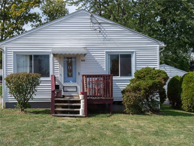 bungalow with a front yard