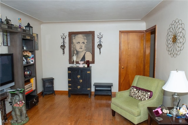 living area featuring hardwood / wood-style flooring