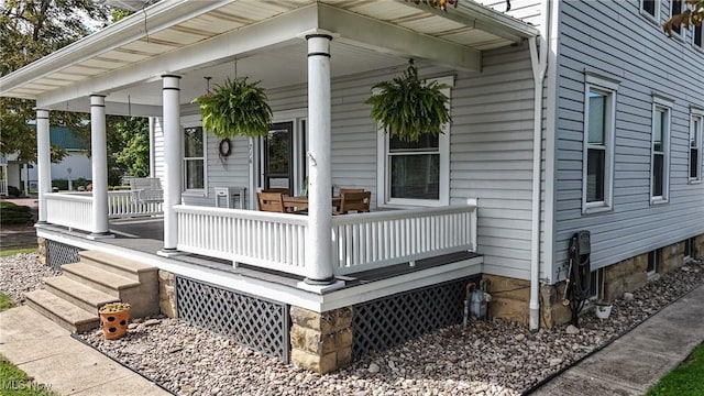 wooden terrace with covered porch