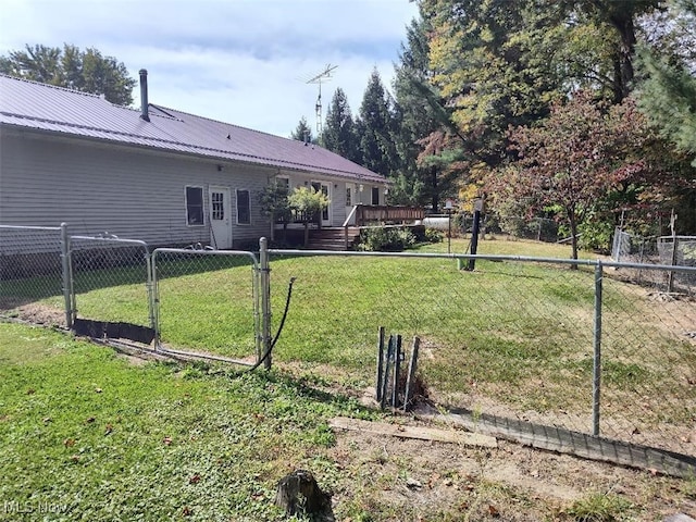 3445 Shaffer Rd, Rock Creek, OH 44084 - view of yard with fence, a wooden deck, and a gate