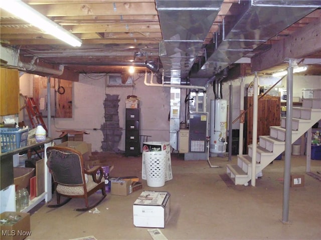 basement with gas water heater and heating unit