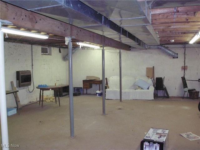 basement featuring heating unit