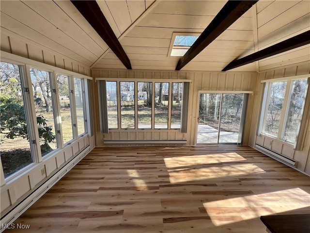 unfurnished sunroom with a baseboard radiator, plenty of natural light, and lofted ceiling with skylight