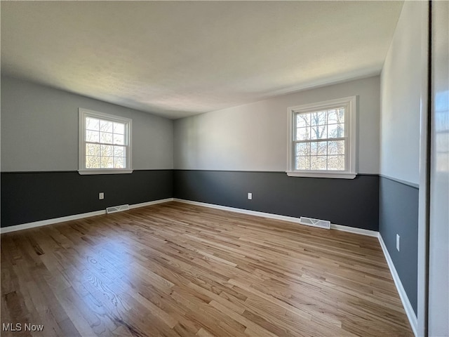 empty room featuring light hardwood / wood-style flooring