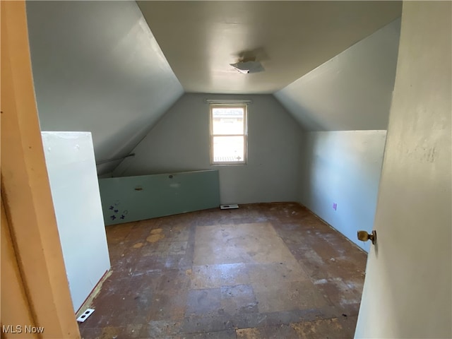 bonus room featuring vaulted ceiling