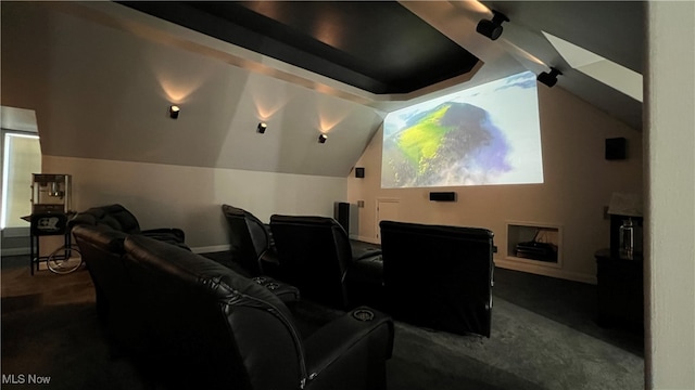 home theater with lofted ceiling