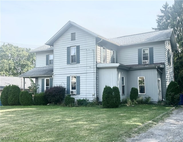 front of property with a front lawn