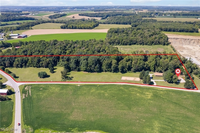 birds eye view of property featuring a rural view