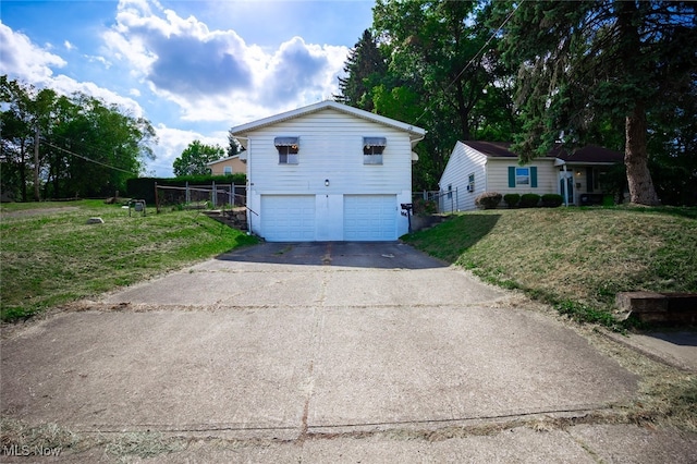 view of side of property featuring a lawn