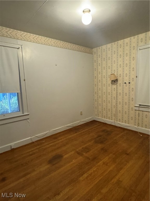 empty room featuring hardwood / wood-style flooring