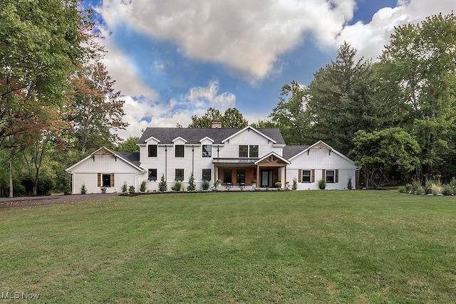 view of front of property with a front lawn and a porch