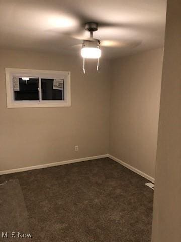 carpeted empty room with ceiling fan